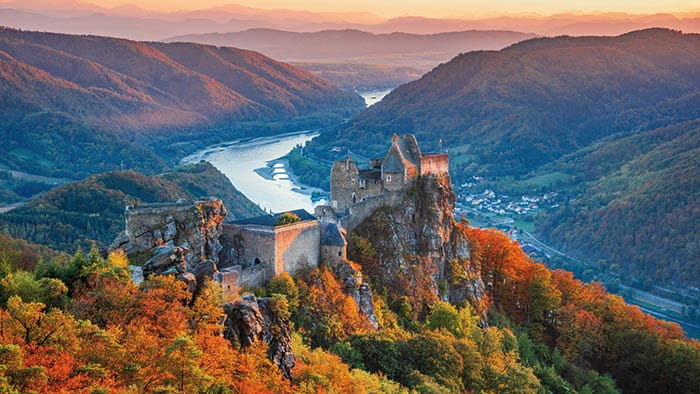 Aggstein Castle along the Wachau Valley surrounded by autumnal coloured trees